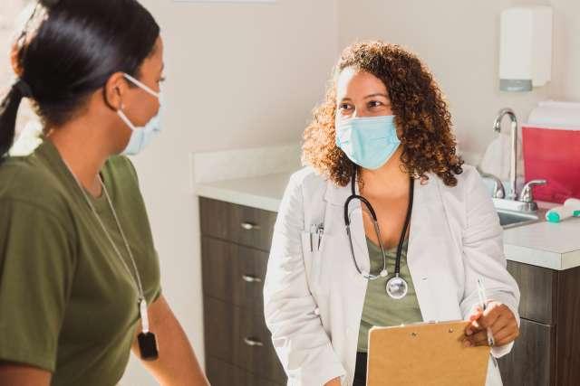 woman patient in doctor's office