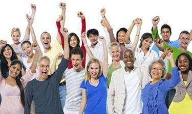 Group of people with arms raised